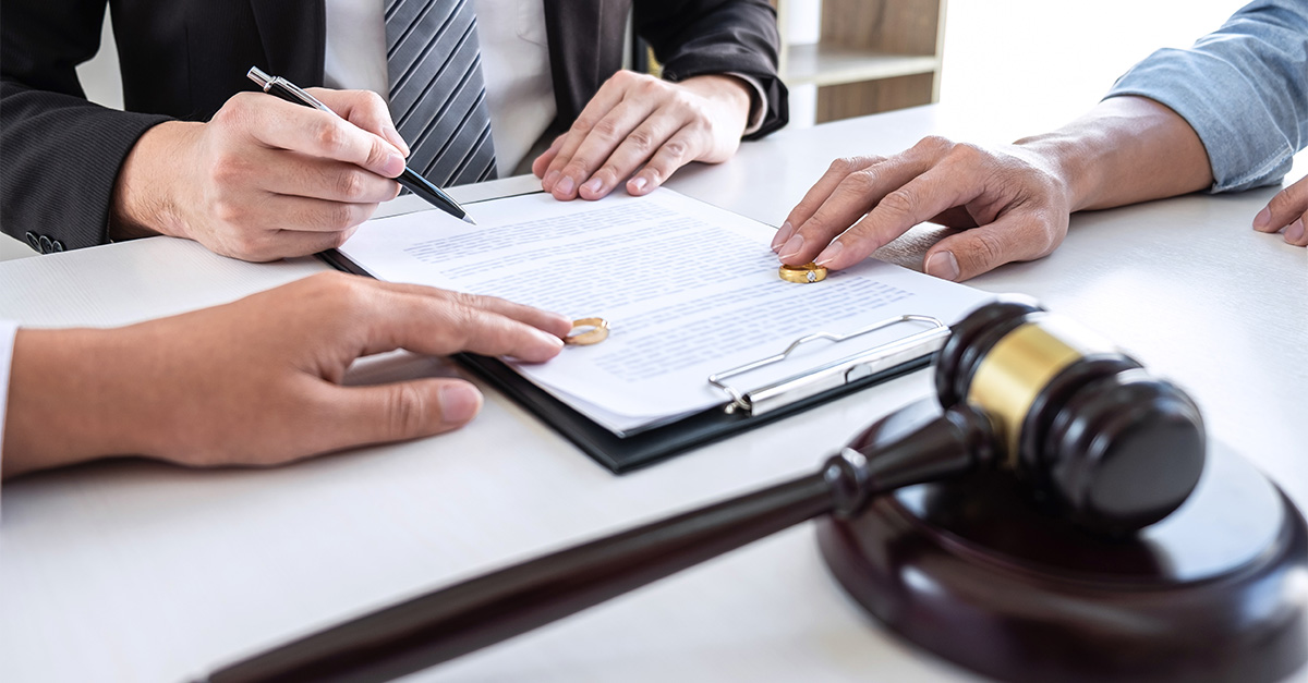 couple in the courthouse getting divorced in lawyers office