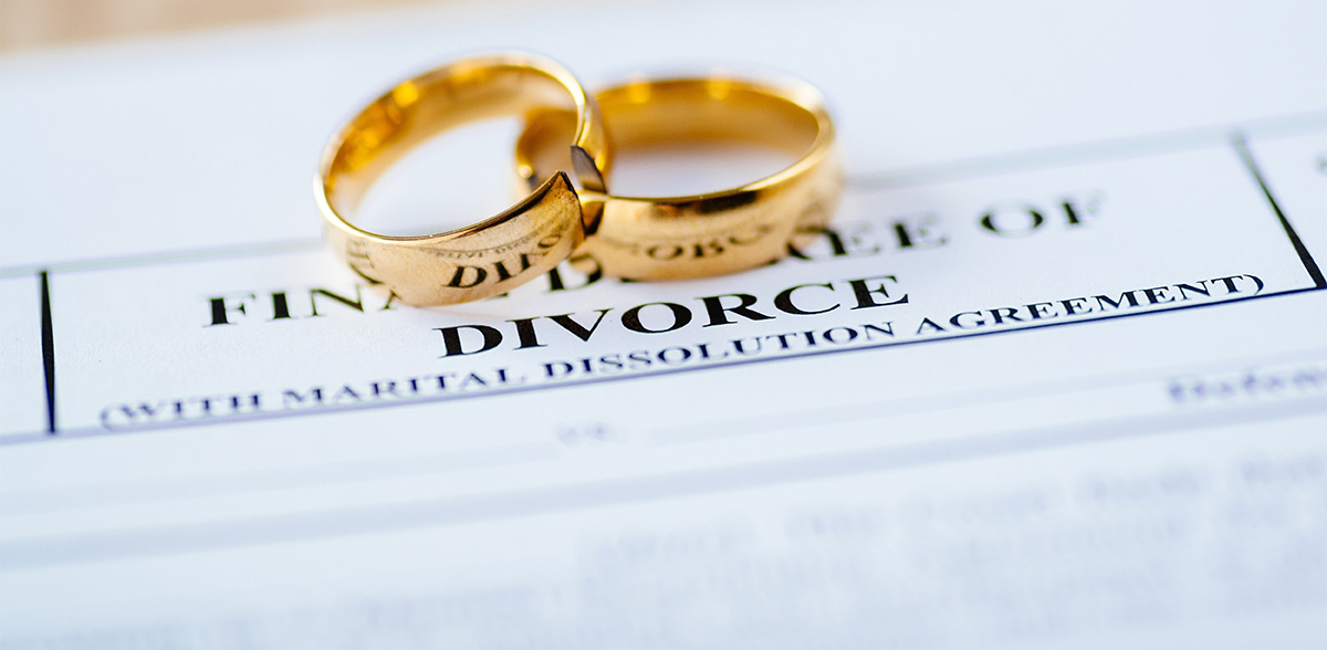broken golden wedding rings divorce decree document